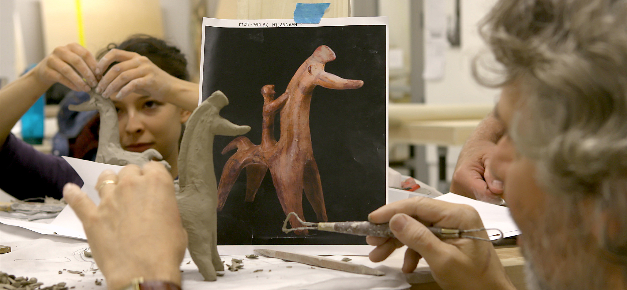MassArt students, working with instructor Chuck Stigliano, build clay models from images of Greek bronze age horses.