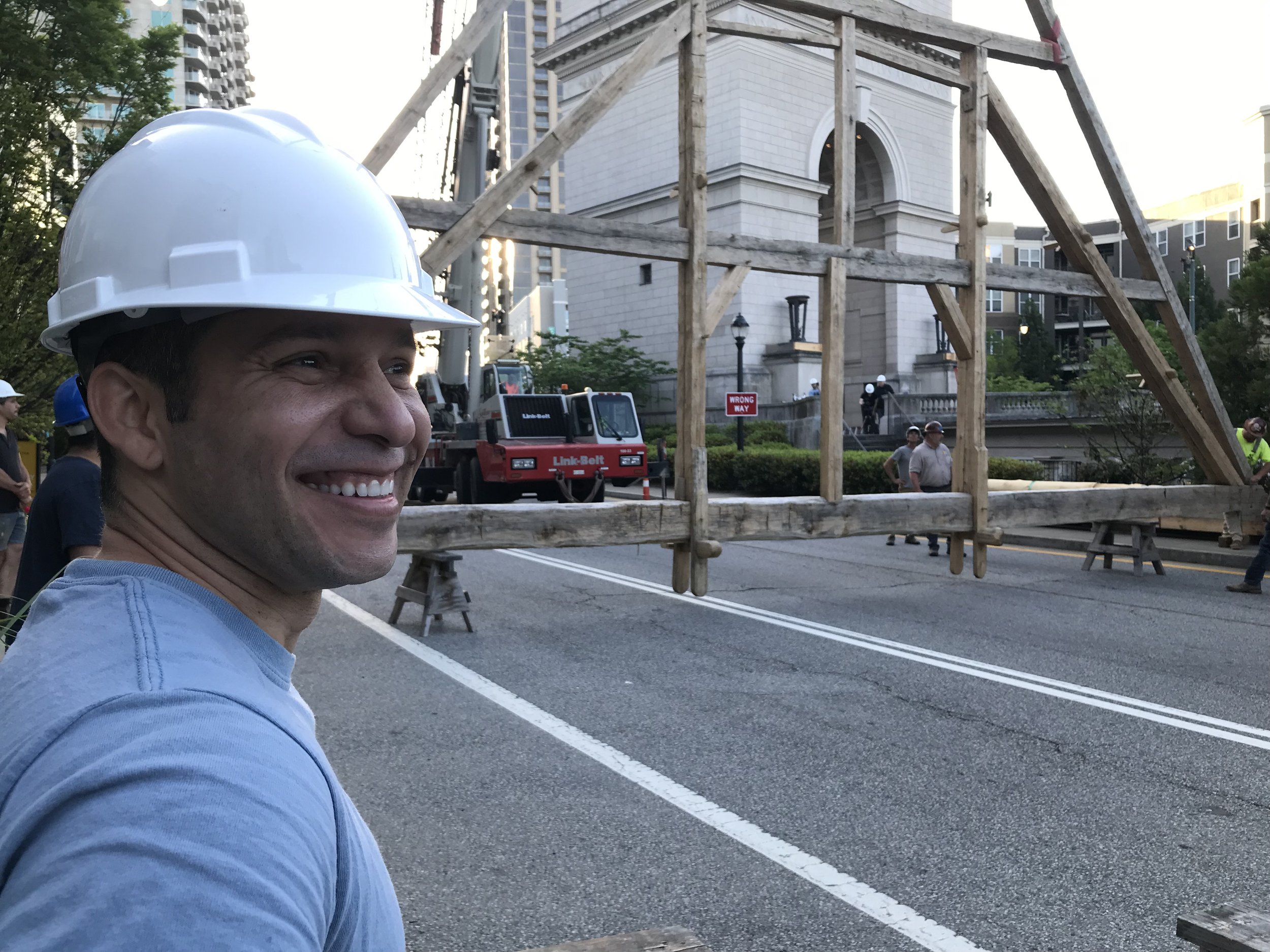 Stunningly multi-talented, Lorenzo DeAlmeida, Catholic University architecture faculty enjoying a moment to marvel at the truss in transit.