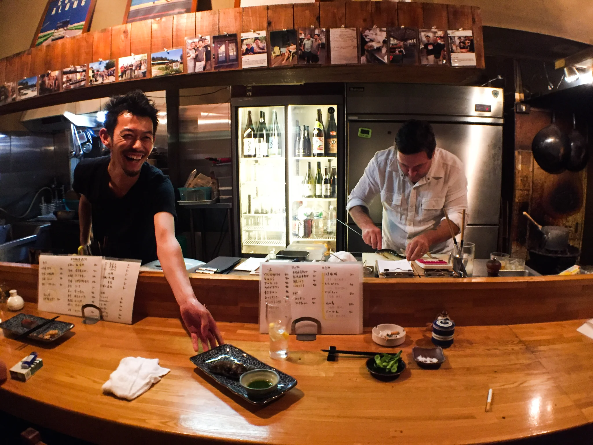 Satoshi and Billy prepare Ayu, a river fish, on skewers at Hiro izakaya.