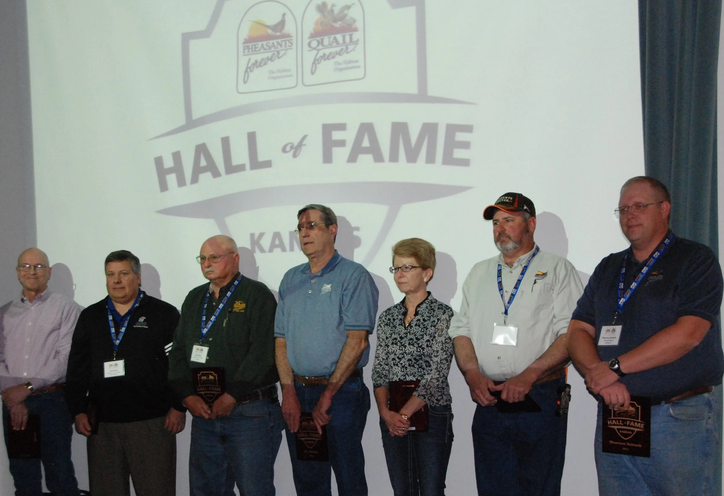 2014 Hall of Fame Inductees (Left to Right) Barth Crouch, Brett Reber, Dick Klaus, Jim Melton, Sue Mann, Heath Hayden, and Shannon Selstedt, (Not Pictured: Bill Brannan and Rick Pauls).