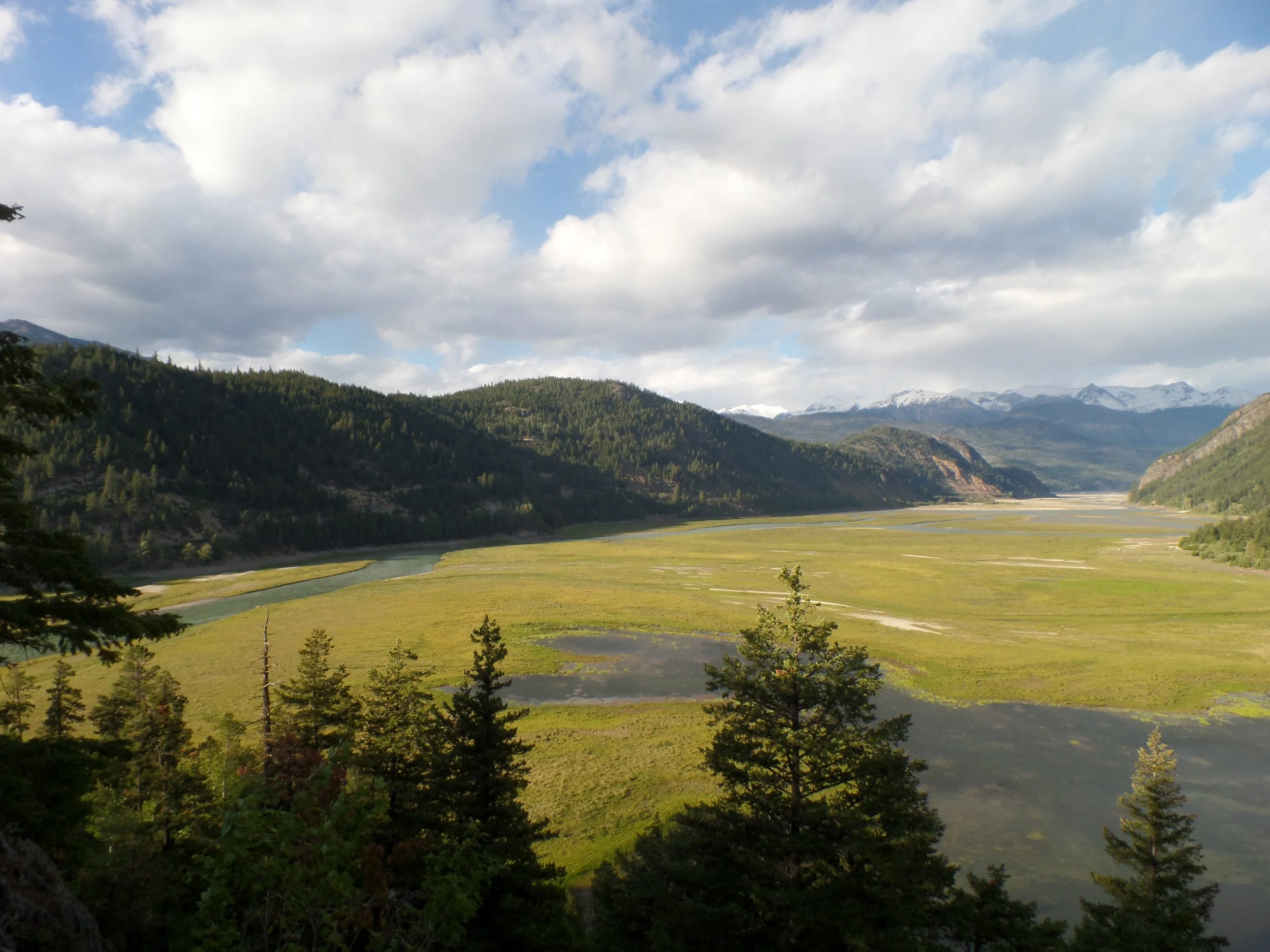  Lush floodplains flow through the valley. 