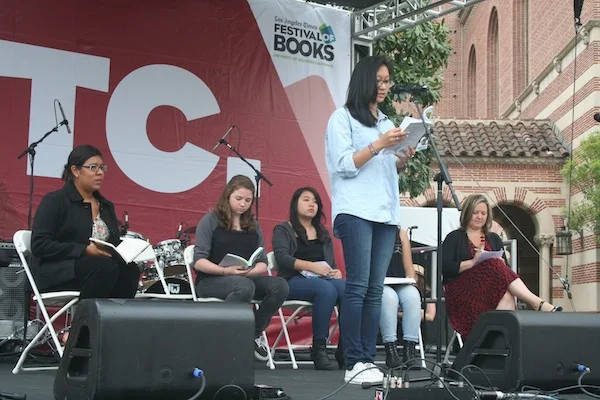 Photo: Camille Crisostomo, 17, read original work during WriteGirl's session. Credit: Tracy Brown