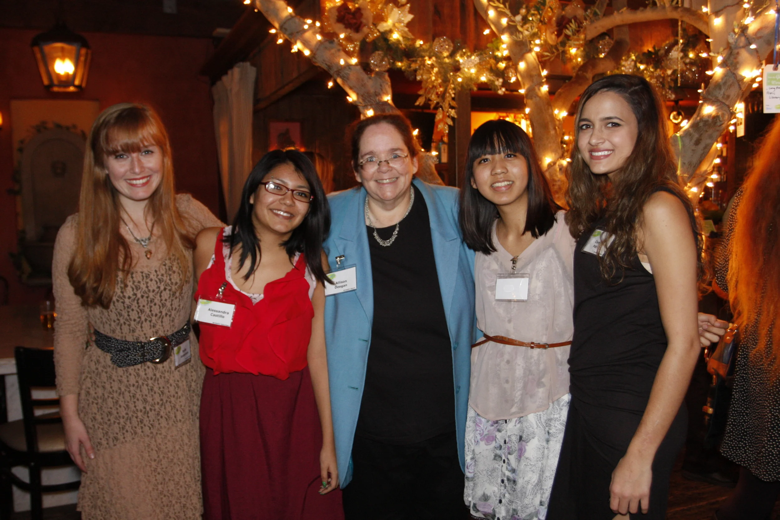 WriteGirl Associate Director Allison Deegan with current mentee Jackie Uy, and alumni mentees Kylie Anderson, Alejandra Castillo, and Camille Patrao. 
