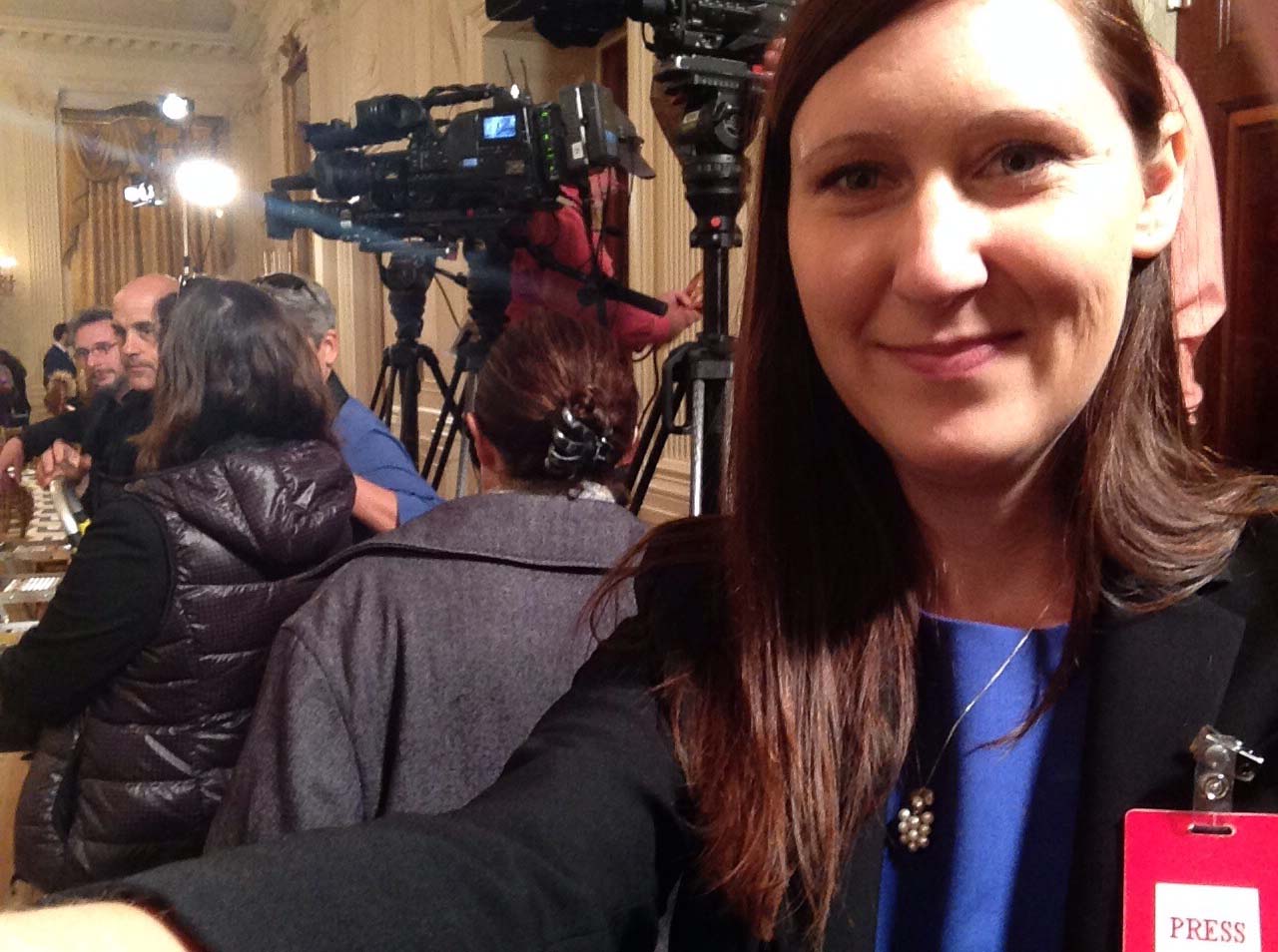 Mentor Katie Geyer taking a selfie with the White House press
