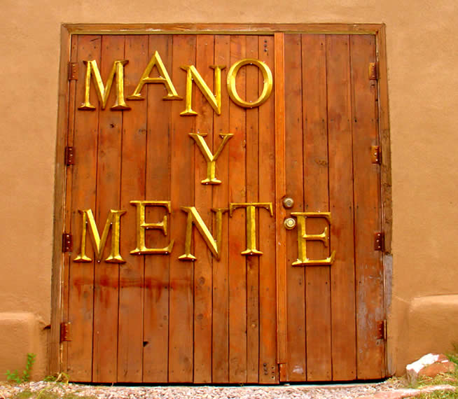 The doorway to the Mano y Mente Artist-in-Residence studio.