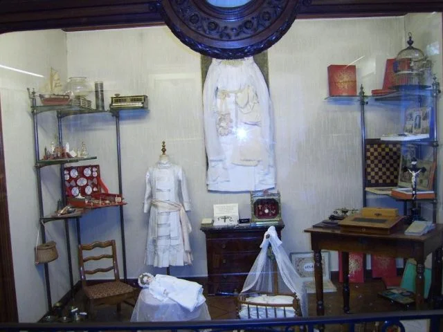 A display of Therese's clothes, playthings, and other possessions