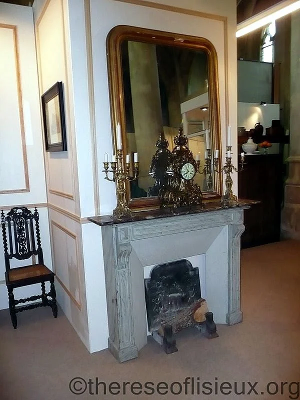 Mantelpiece, clock, mirror, and candlesticks of Louis and Zelie Marti