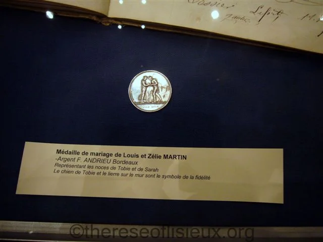 LOUIS AND ZELIE'S ORIGINAL MARRIAGE MEDALLION, NOW IN THE CUSTODY OF THE DIOCESE OF SEES. PHOTO COURTESY OF SUSAN EHLERT.