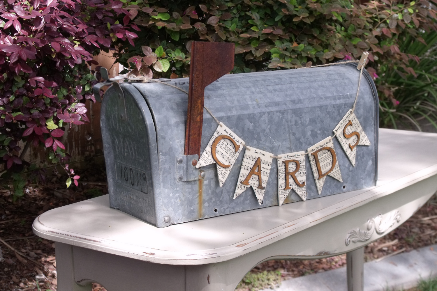 "CARDS" Banner - $10 Wood pennants decoupaged with vintage sheet music