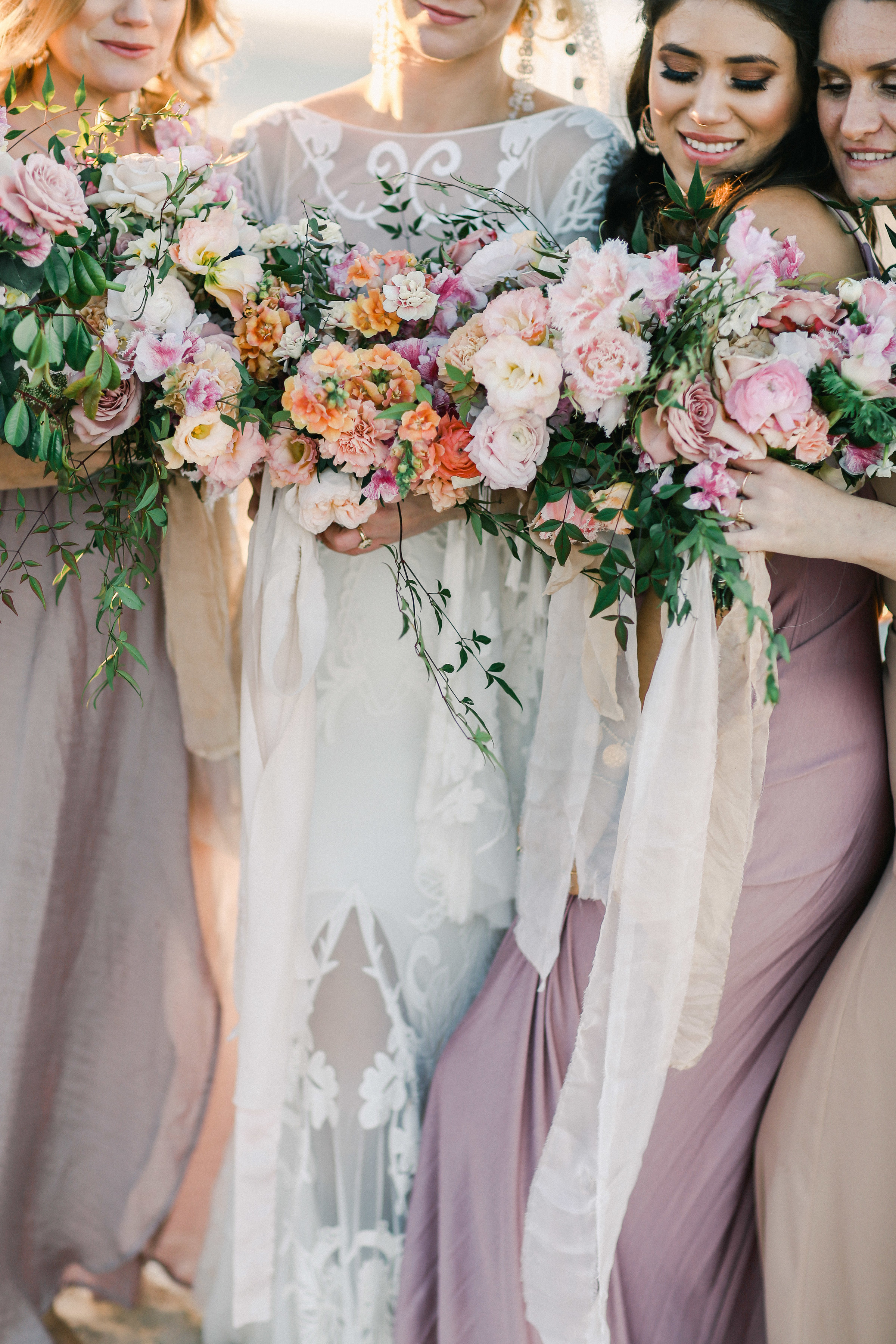Byron Bay Bride and bridesmaids : pink and taupe dresses : beautiful bouquets .JPG