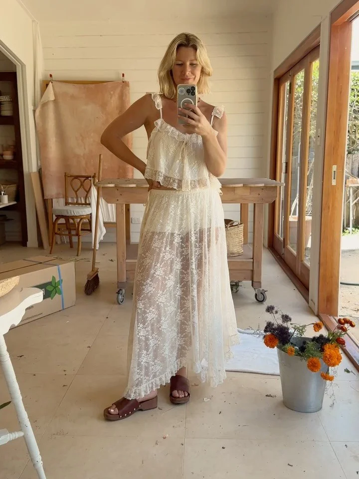 Just a girl between flower arrangements, and a very messy studio, trying on pretty things &mdash; still not over this lace @spell