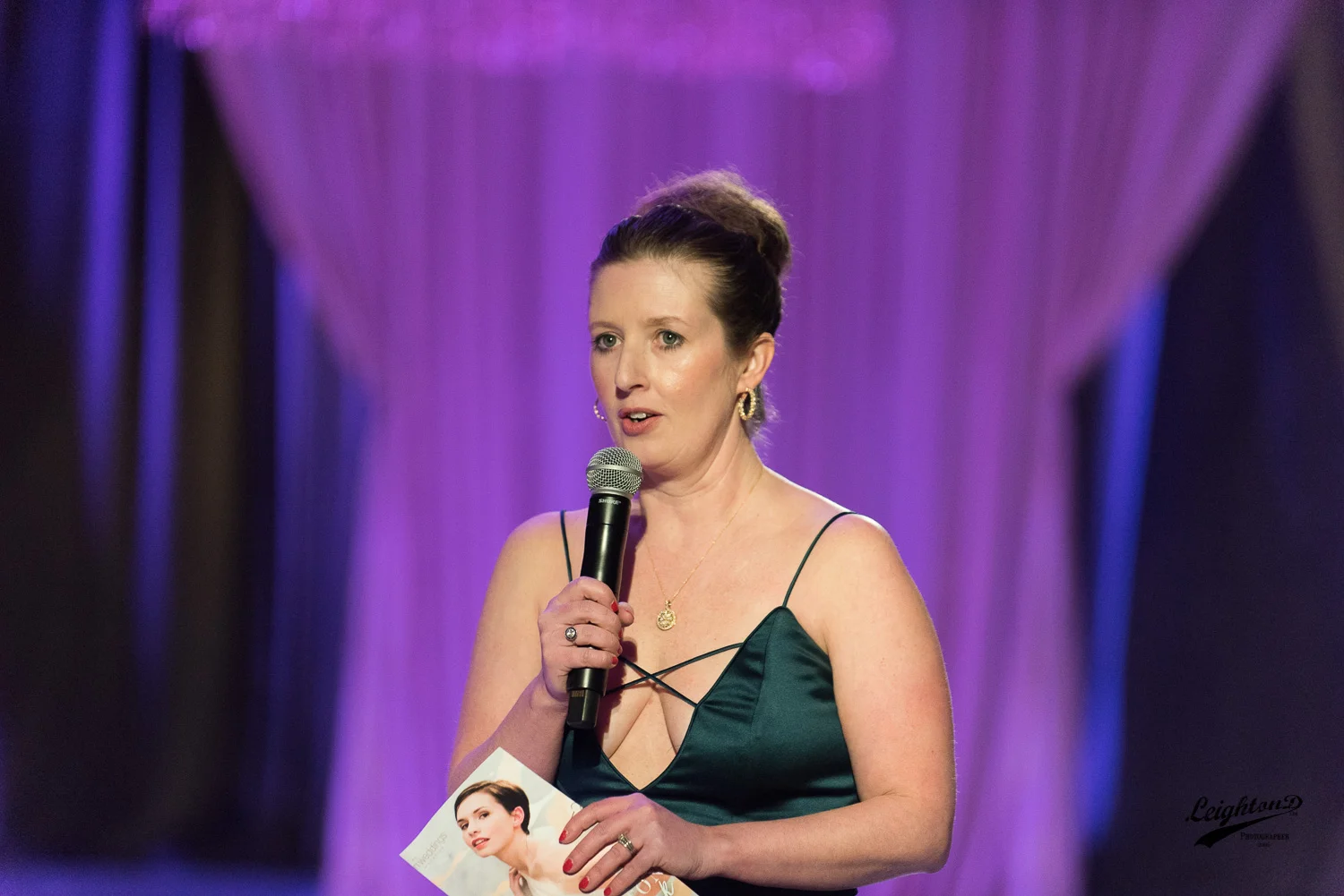 Event emcee, Della MacNicholas, opens the Designer Shows