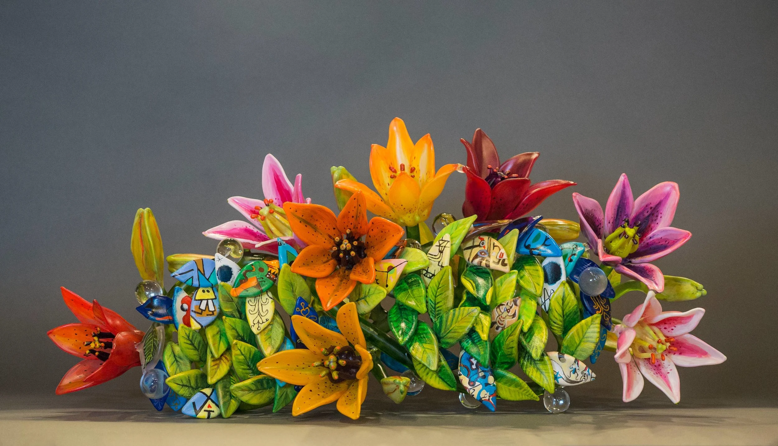 2017_Lily_Handled_Basket_of_Flowers2_15h_x_18w_x_14d by Ginny Ruffner