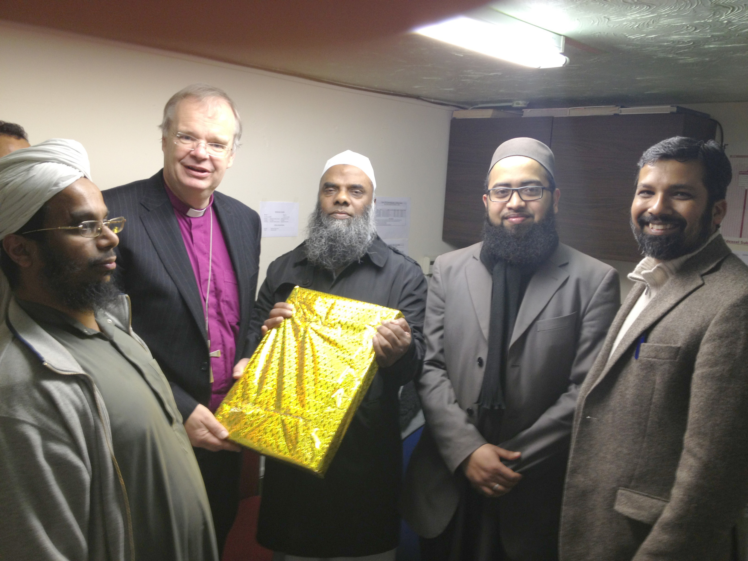 Bishop Richard being felicitated at the Bury Park Jamia Masjid.jpeg