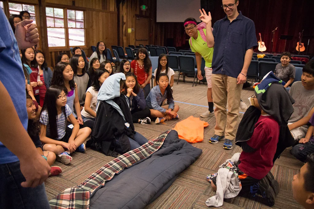 Don't forget about the fun games we played! The "Blanket Game" is always a classic. Somehow, participants always end up dressing up like desert nomads...