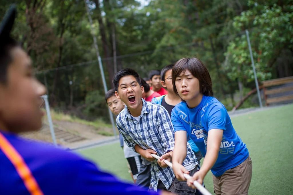 Another good ol' classic is Tug of War. Here, the guys pump themselves up to defeat their archnemesis: the girls...