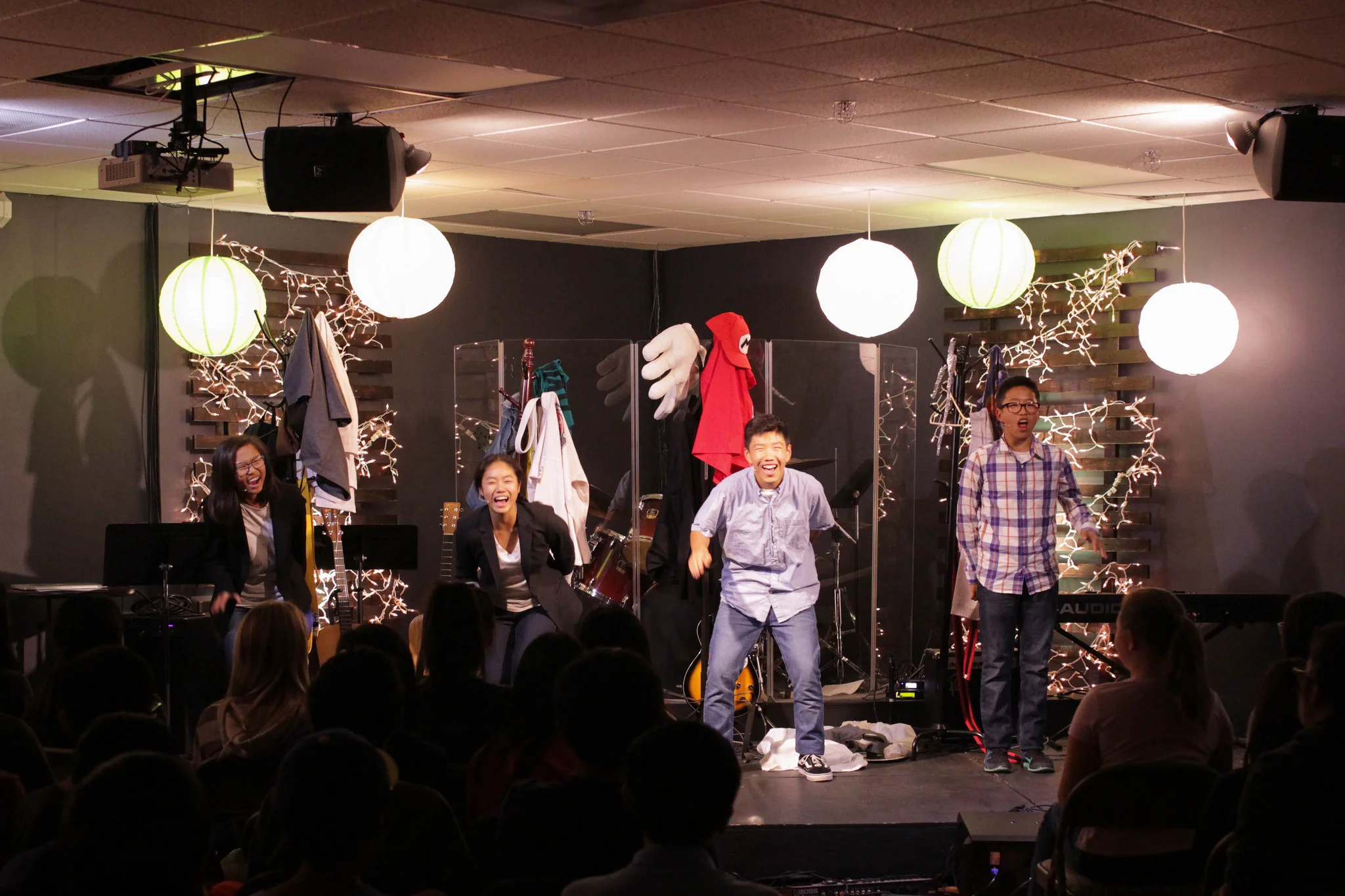 Then, we watched a funny skit performed by our own MS students! It was about 4 different people who each pursued happiness in their own way but were left unsatisfied in the end. The students did a great job after all their hard work and practice.