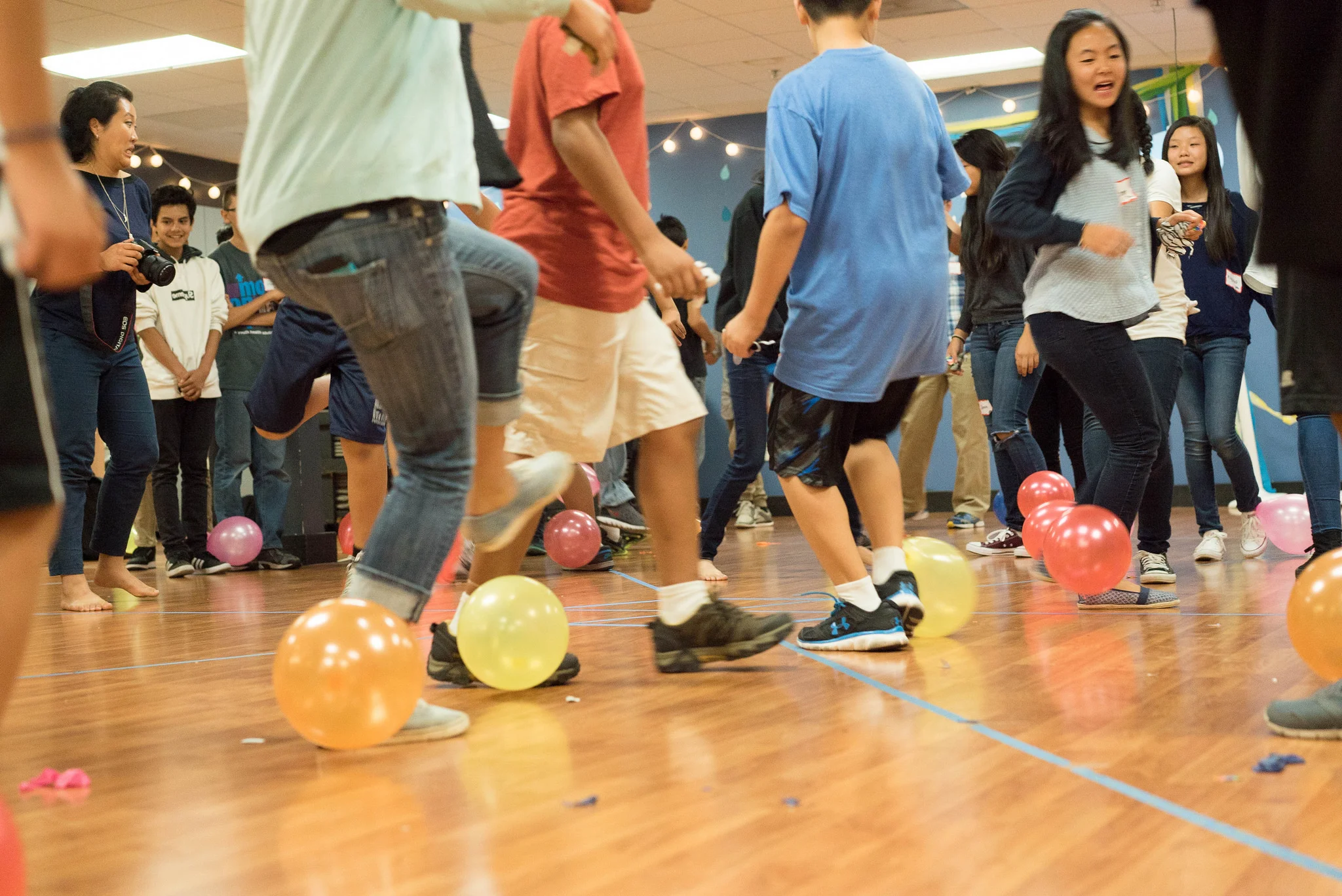After Dan's message, we all cleared the room to play some fun and crazy games that involved throwing stuffed animals and popping balloons. 