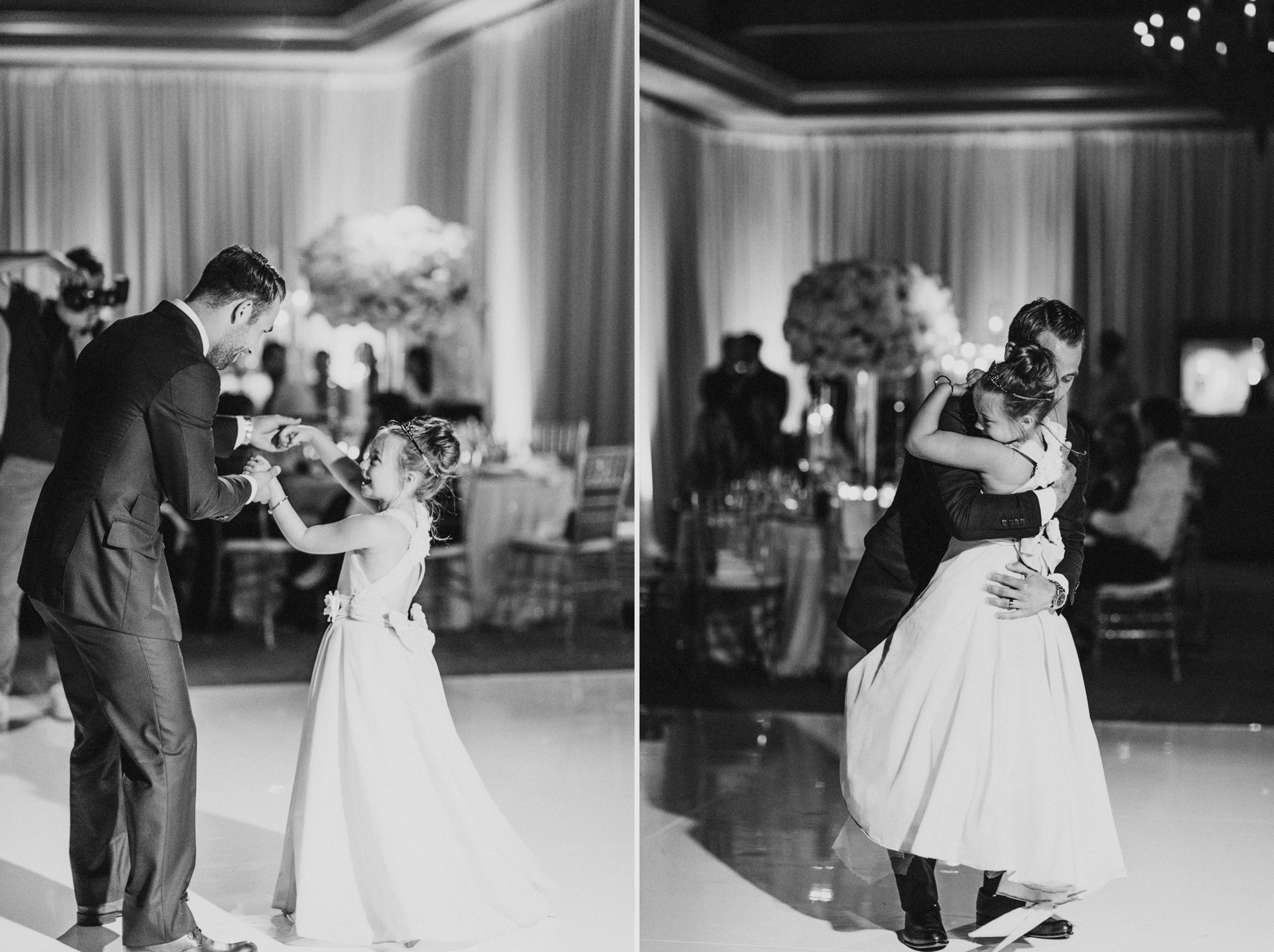 A groom dances with the flower girl during a Newport Beach wedding reception at The Resort at Pelican Hill.