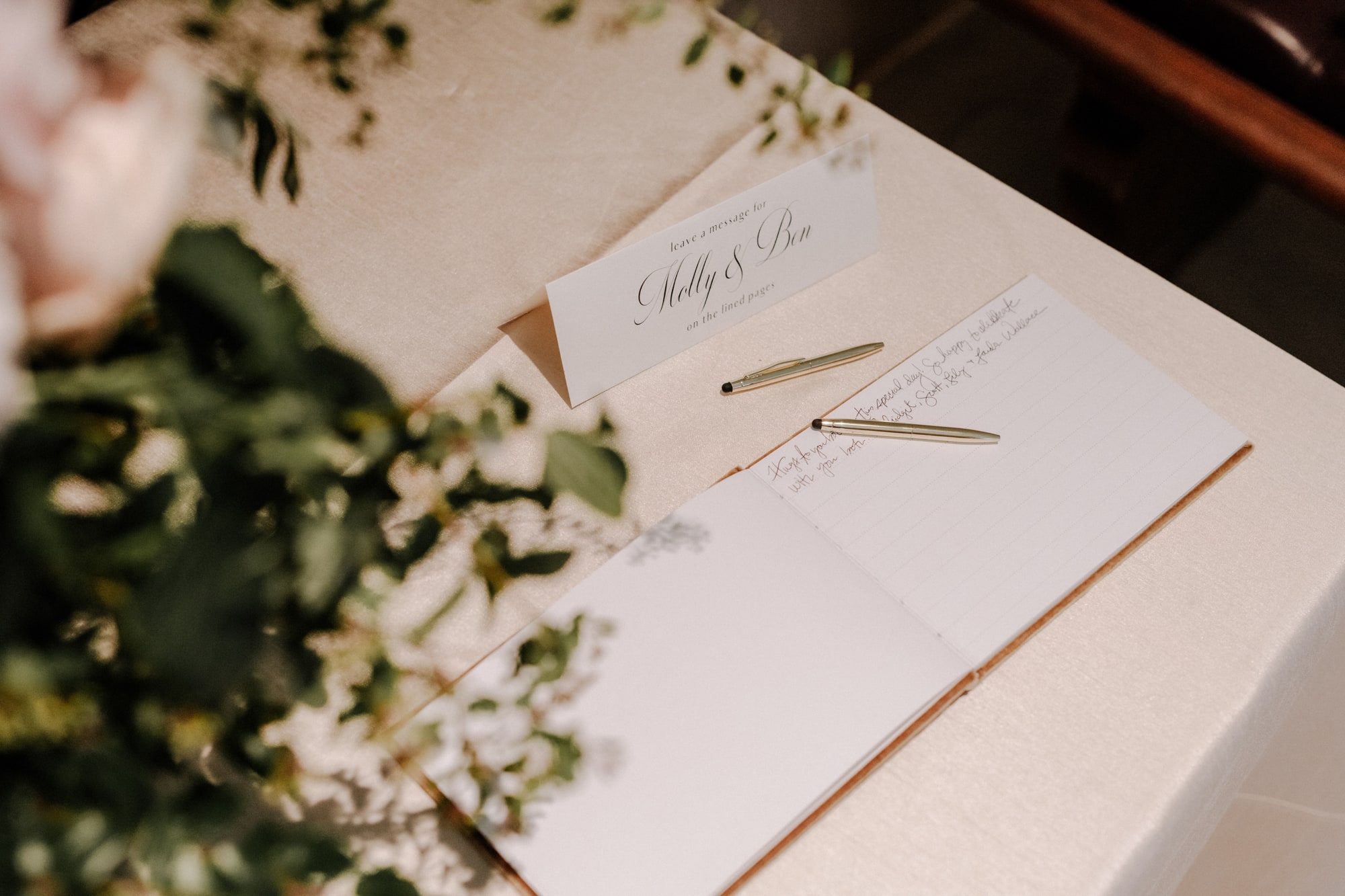 An elegant guest book sits on the table during a wedding at Minneapolis Institute of Art.