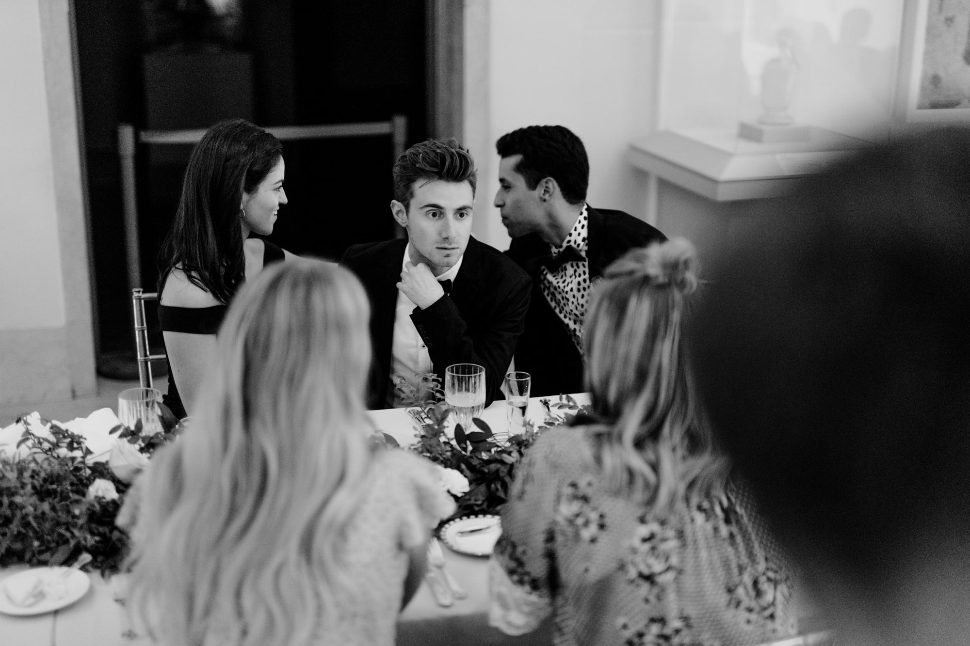 Guests chat during during at a beautiful wedding at the Institute of Art in Minneapolis.