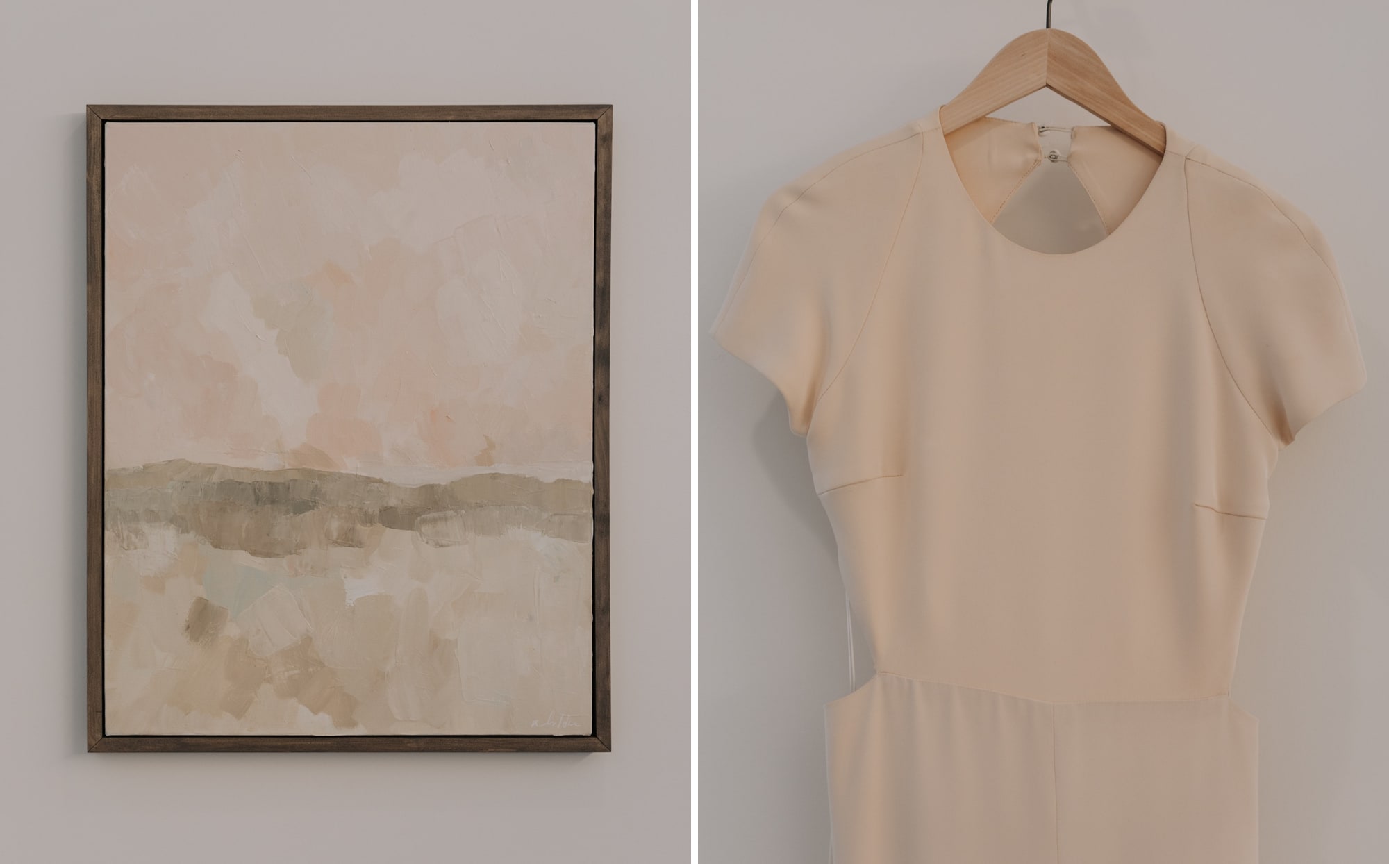 A blush pink painting hung on a wall in a Minneapolis wedding venue.