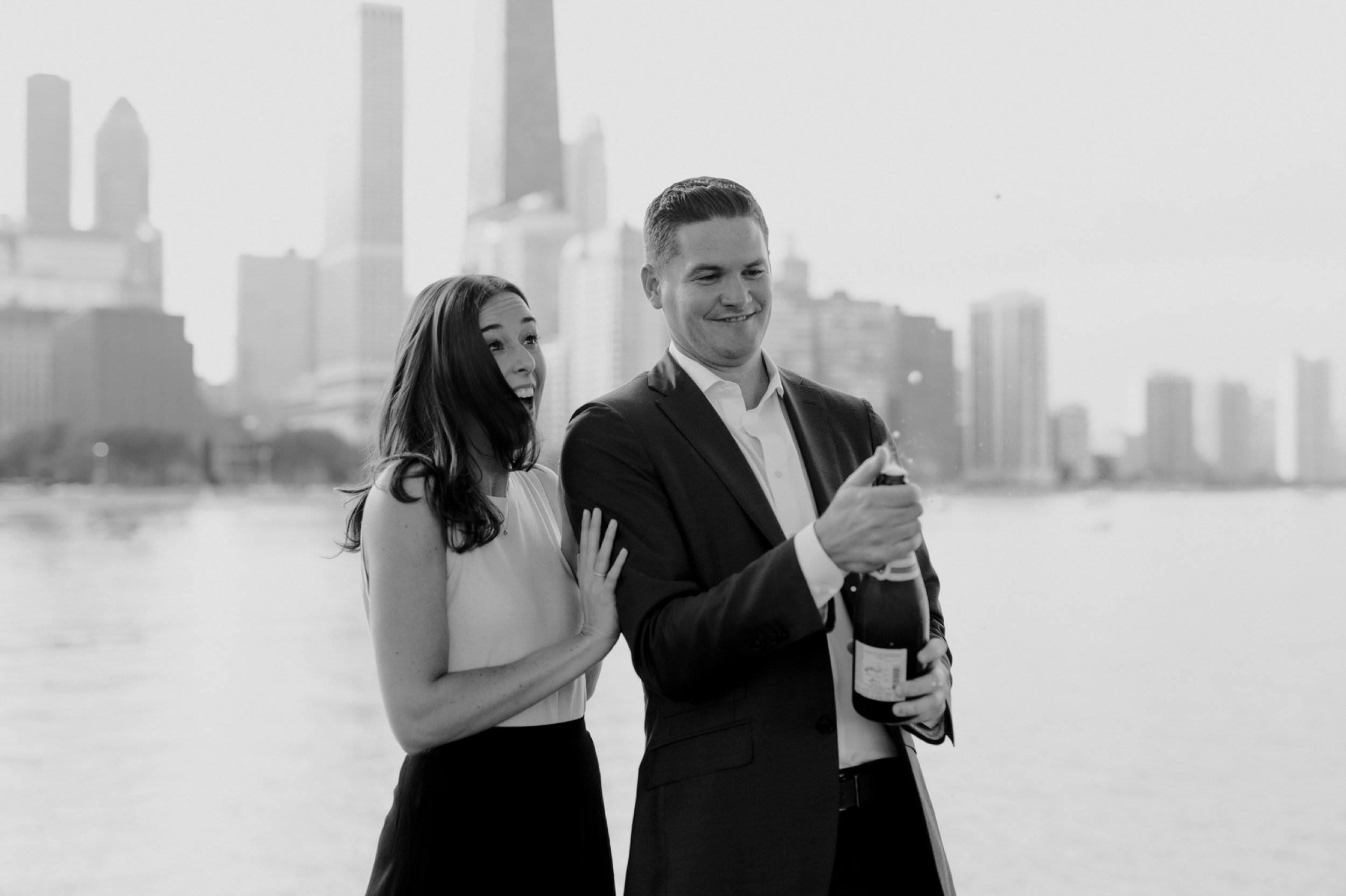 4_Downtown-Chicago-Engagement-Photos-champagne-pop.jpg