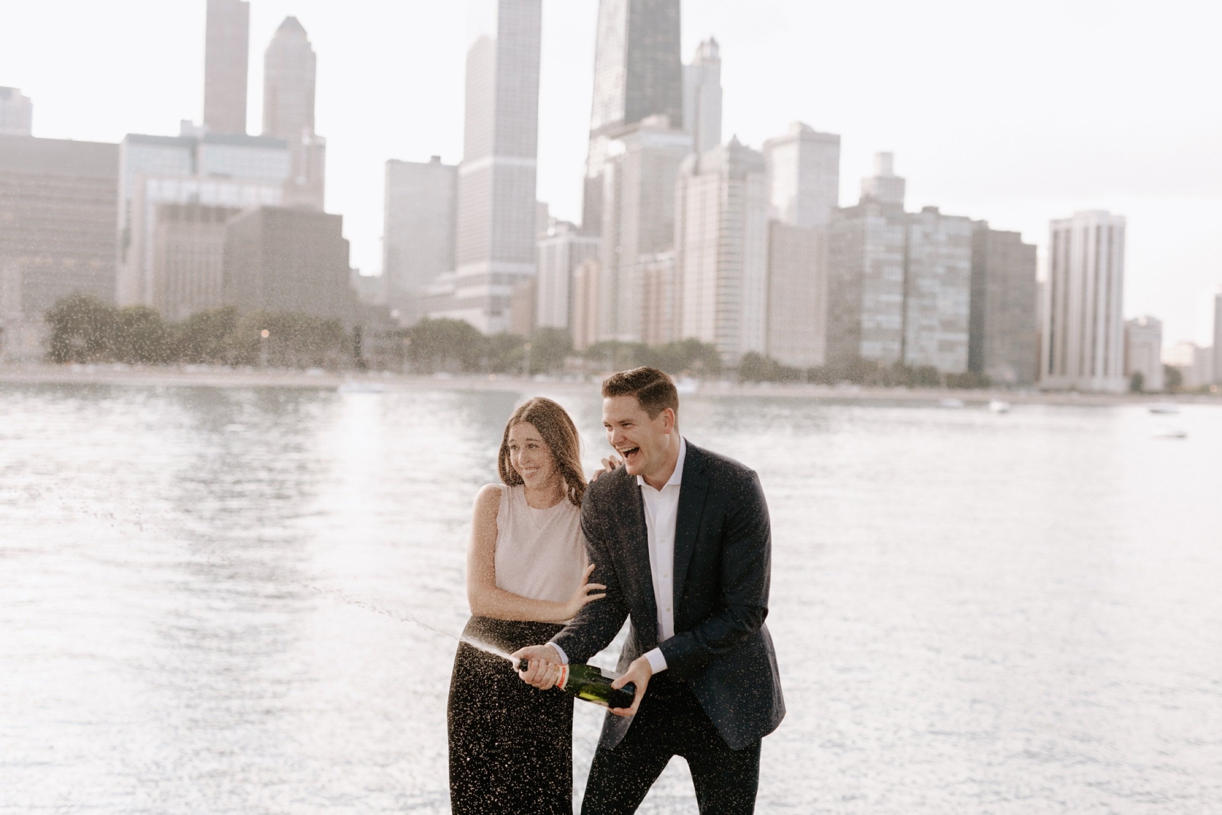 5_Downtown-Chicago-Engagement-Photos-champagne-pop.jpg