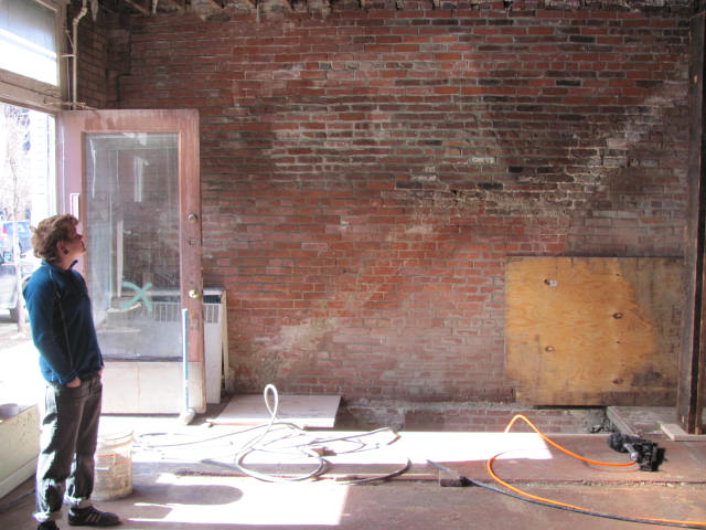 Here you can see the stairs have been removed. It really opens up the front of the space.