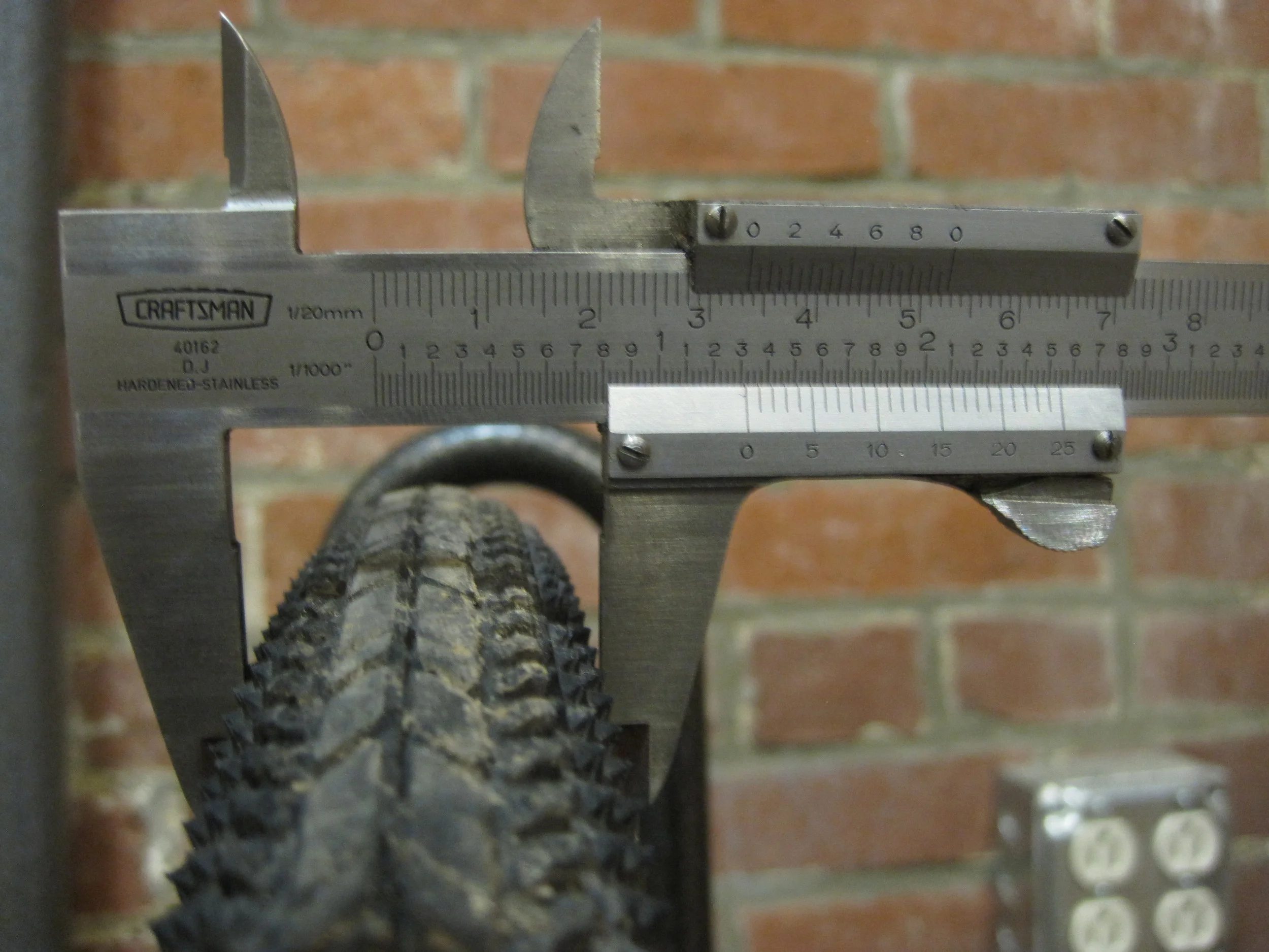 When mounted on the H+Son TB14 rim the tire measured a little less than 34mm.
