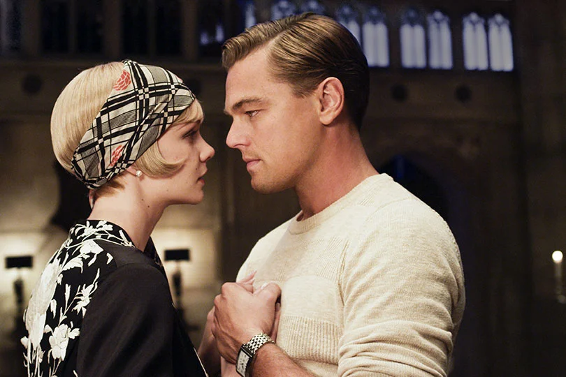 daisy-buchanan-and-jay-gatsby-share-a-tender-moment-looking-into-each-others-eyes-136724264930002601-130607111655.jpg