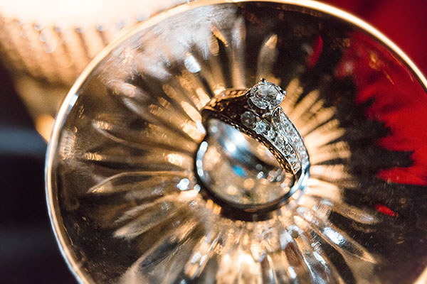 After metering for the candle light and bringing a very small touch of flash (1/128th power with a small grid and gelled at 1/2 CTS) , I took a few frames.