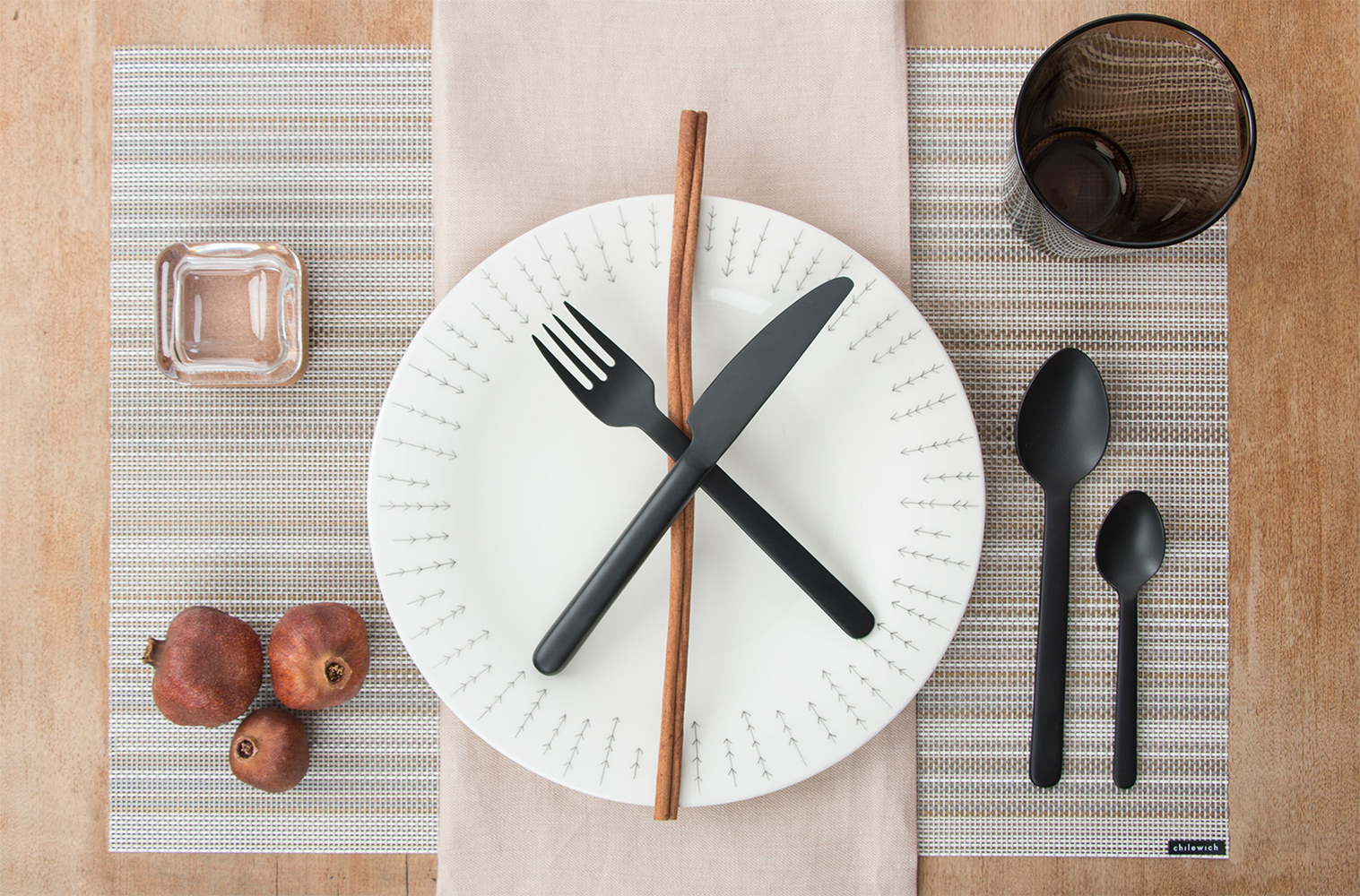 Iittala Sarjaton Dinner Plate in Metsa/White , Menu New Norm Flatware in Black , iittala Kartio Large Tumbler in Sand , iittala Vitriini Boxes , Chilewich Placemat in Multi-stripe Champagne , Libeco Home Finn Napkin in Camel