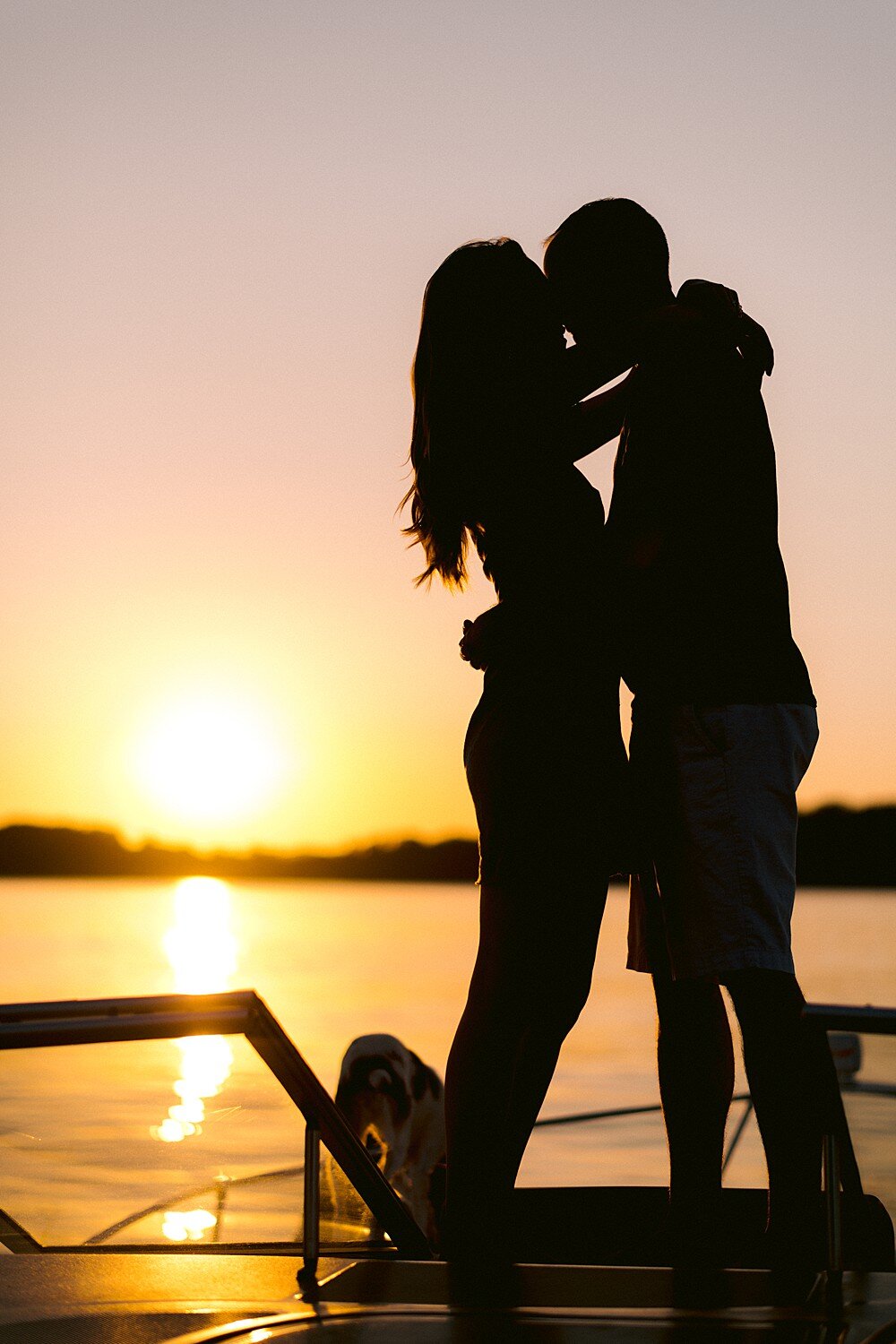 sunset-silhouette-couple-on-boat-windriver-tellico-lake-engagement-kristi&amp;jeff