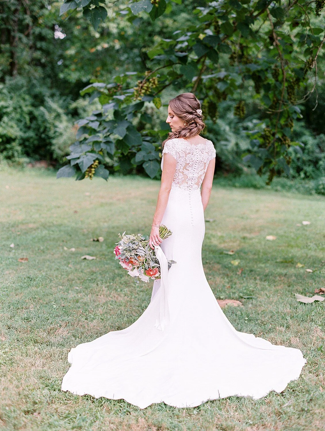 Couple stance with balanced weight for natural, relaxed lines.