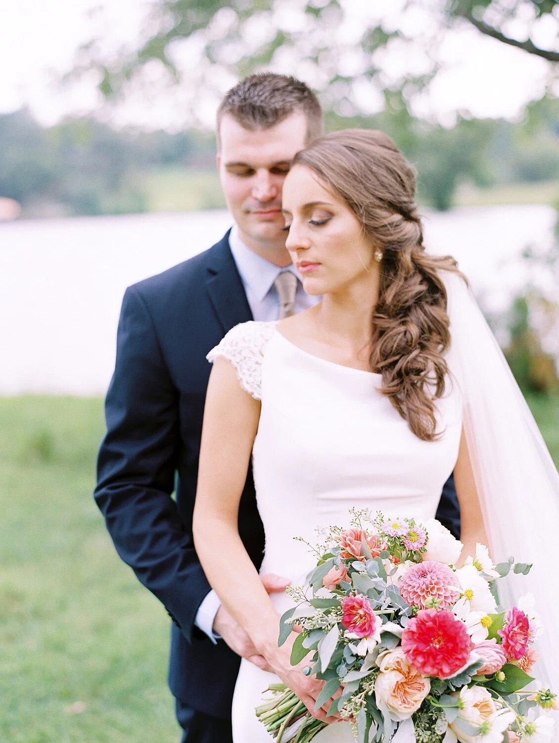 Romantic close-up—gentle head tilt and soft focus.