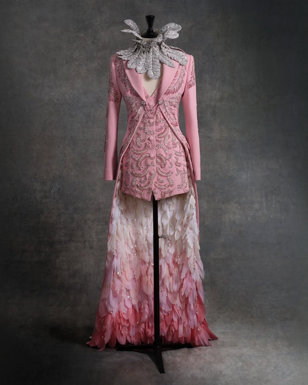 @AdutAkech echoed the grandeur of the Swarovski Swan in a gilet-inspired mini dress and floor-le (2).jpg