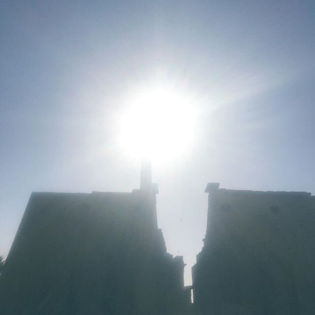 Only the obelisk can touch the sun. The sun, Ra or Re, welcomes us to Karnak. 𓀥𓁿𓀥.  #desertlight #obelisk #sunsoaked #beyondearth #holyegypt #templeplex #roadofpharaohs