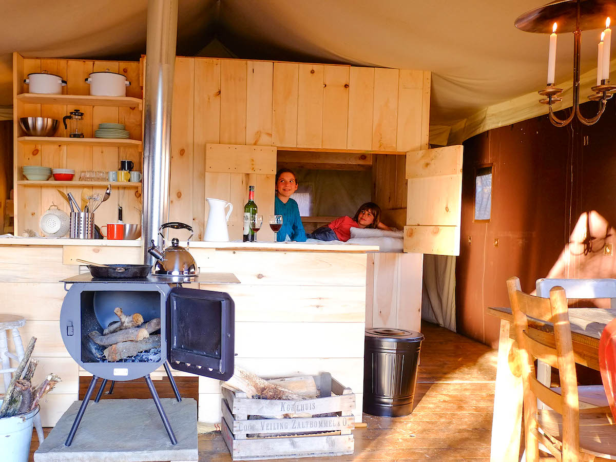 For the full experience, stay the weekend in a spacious, rustic platform tent with running water and wood stove!