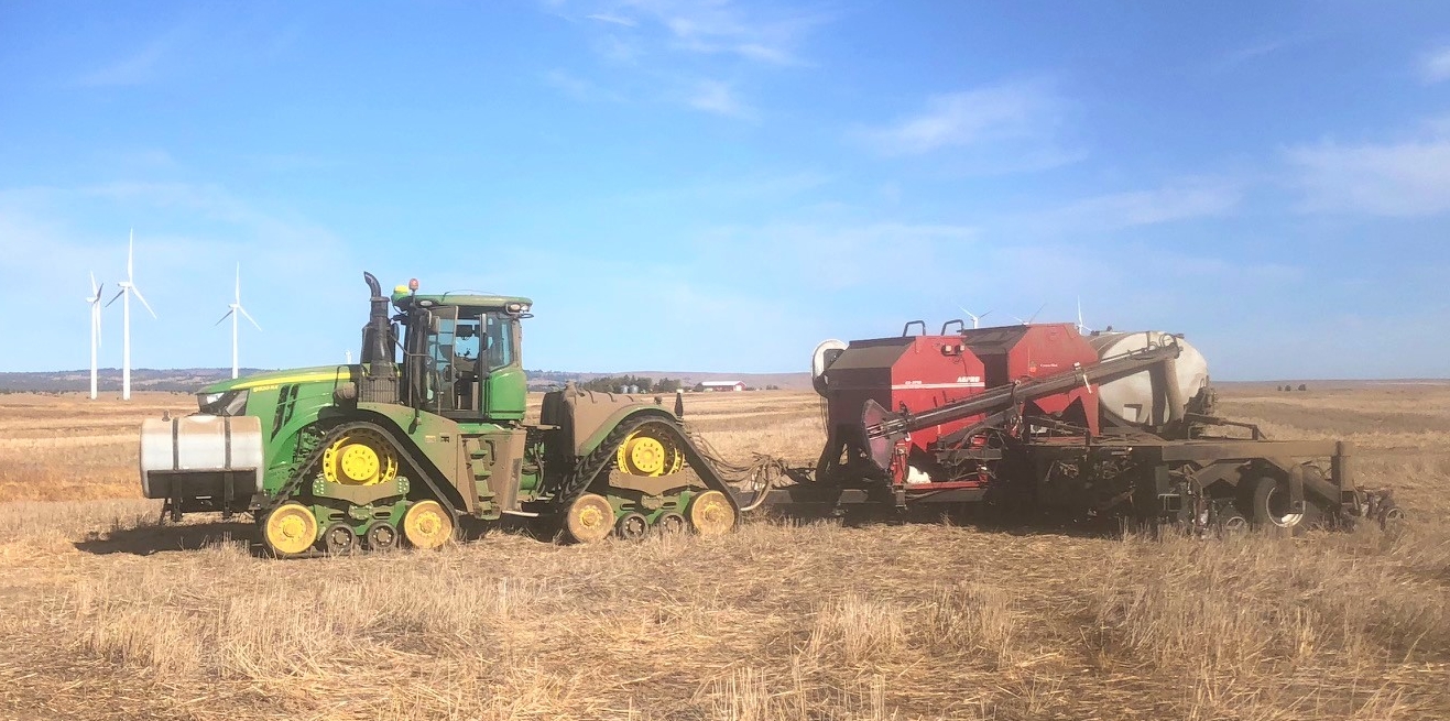 John Deere 9RX with Customer's tanks.