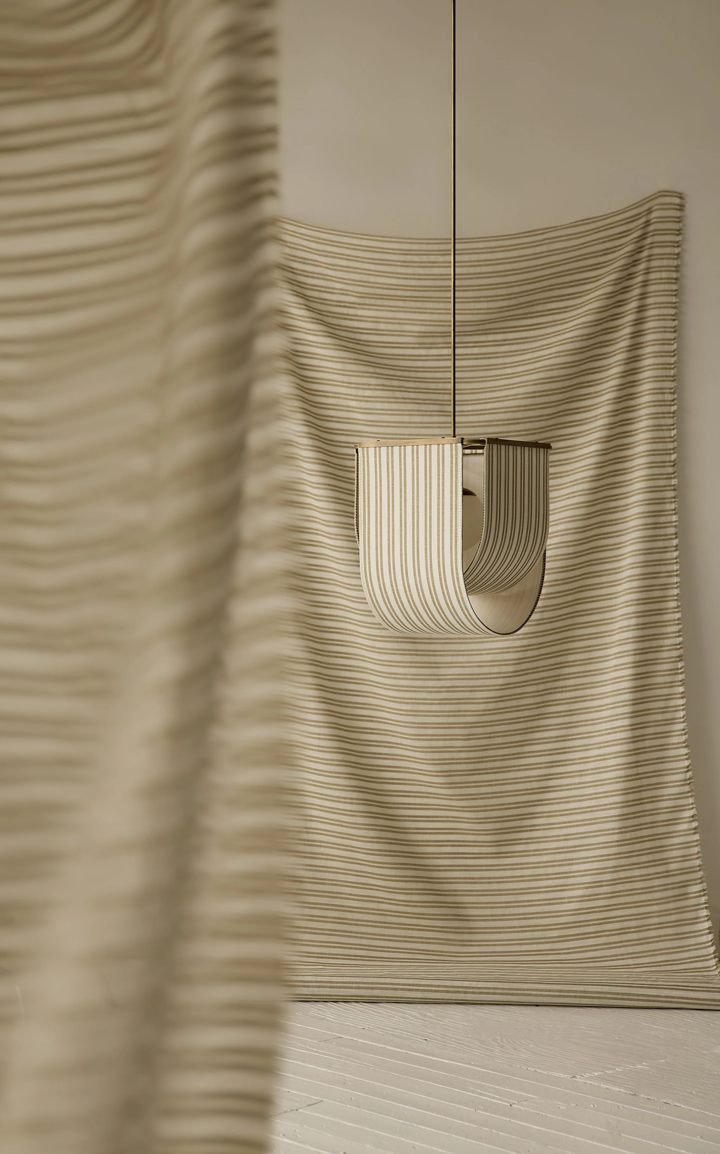 Michel Pendant by Studio Nicholas Obeid, shown in a custom striped Zak + Fox fabric