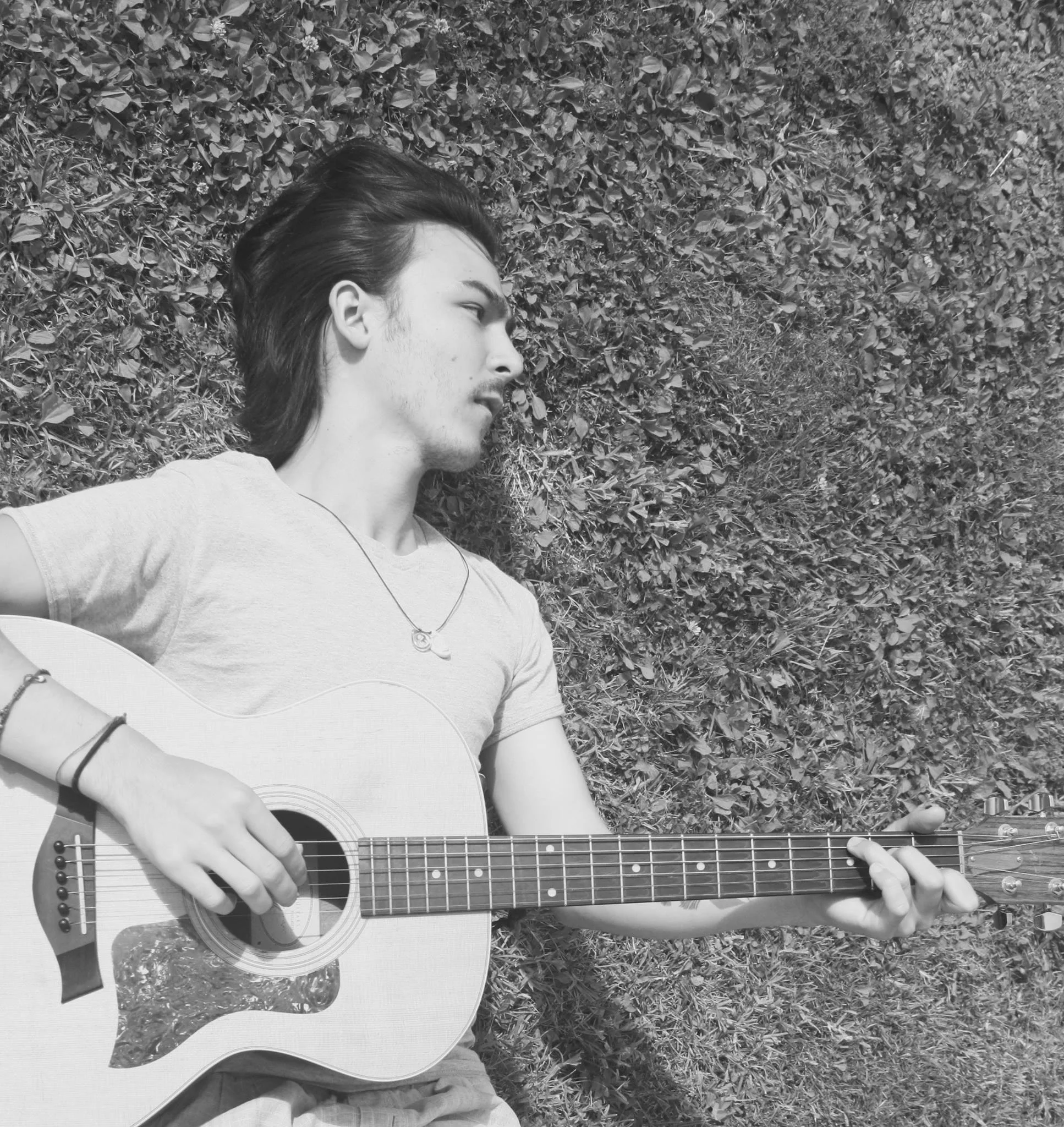Halla Bio-- Henry Nozuka is a Singer Songwriter from Toronto. Growing up in a musical family he began writing songs at an early age. He is getting ready to release his first album in the new year.