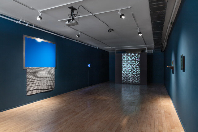 Installation view of Celestial Dew Trap , Behold, the Net! , and Pacific Ocean Copper Mining Protestor This installation of new works by Barbara Hobot is a distillation of, and artistic response to, a two-year period of research. This research