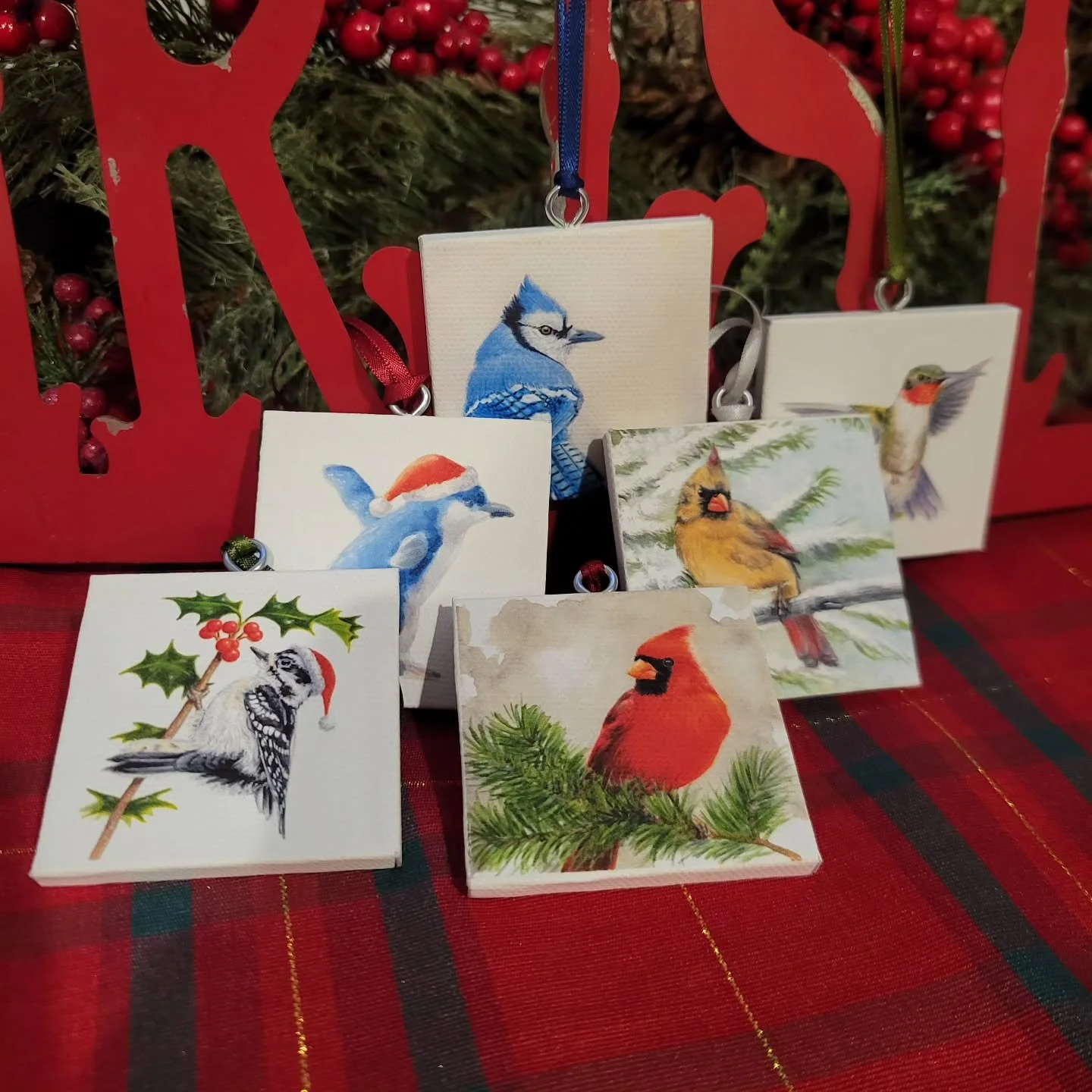 NOW ON ETSY!

I've now made enough stock to finally get these bad boys listed on the Etsy shop. These 6 handmade (Note: not hand-*painted*) ornaments are 2&quot;x2&quot; on wrapped canvas, strung up with an adorable little ribbon. I'm particularly pr