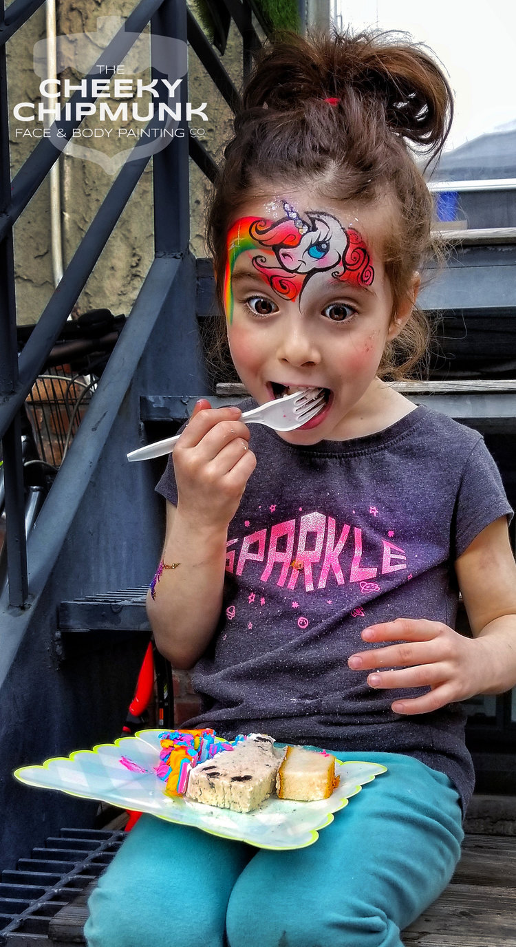 lenore-koppelman-the-cheeky-chipmunk-unicorn-cake-brooklyn-birthday-party-face-painting-little-girl-happy-birthday-sitting-steps-backyard-eating-nyc.jpg