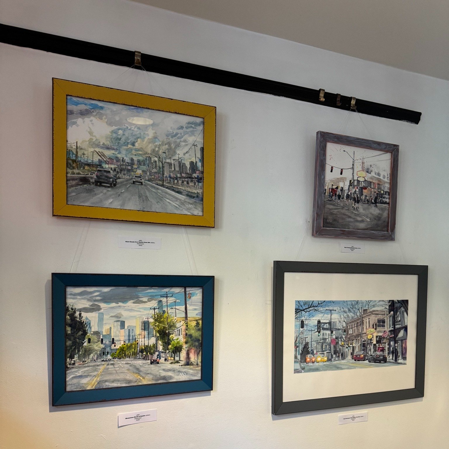 Think you can spot these iconic West Seattle scenes? 🎨 The incredibly talented @andrewwoodsdavid has brought them to life, and his stunning paintings are now on display at Hotwire Coffee. Swing by and see them for yourself! 

#westseattle #westseatt