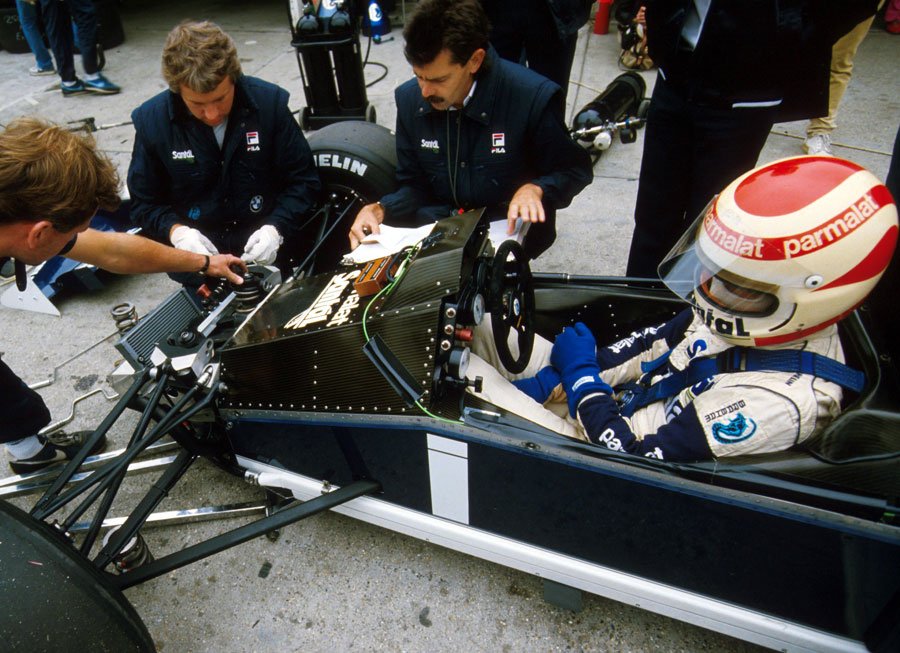 Charlie Whiting and Gordon Murray working on Nelson Piquet's Brabham at the 400th F1 race - the 1984 Austrian Grand Prix.