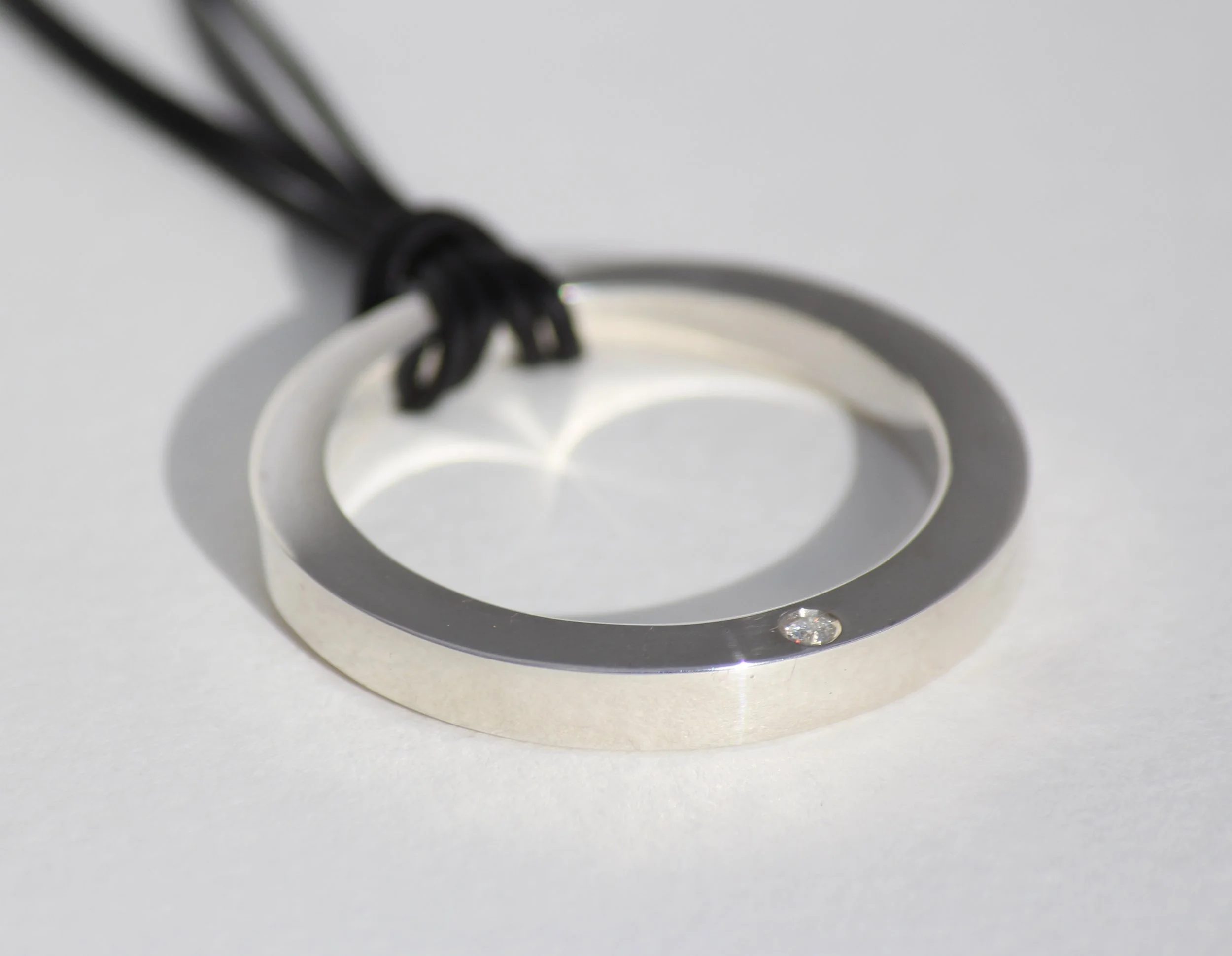SCULPTURAL GRAND CIRCLE PENDANT + CORD • OPTIONAL DIAMOND + ENGRAVING