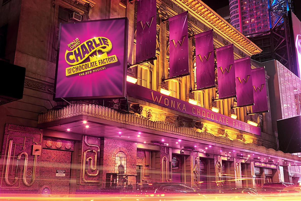 There are lots of hidden jokes (aka "Easter Eggs") throughout the facade. The biggest Easter Egg? If you look closely, the winding pipes spell out "WONKA!"
