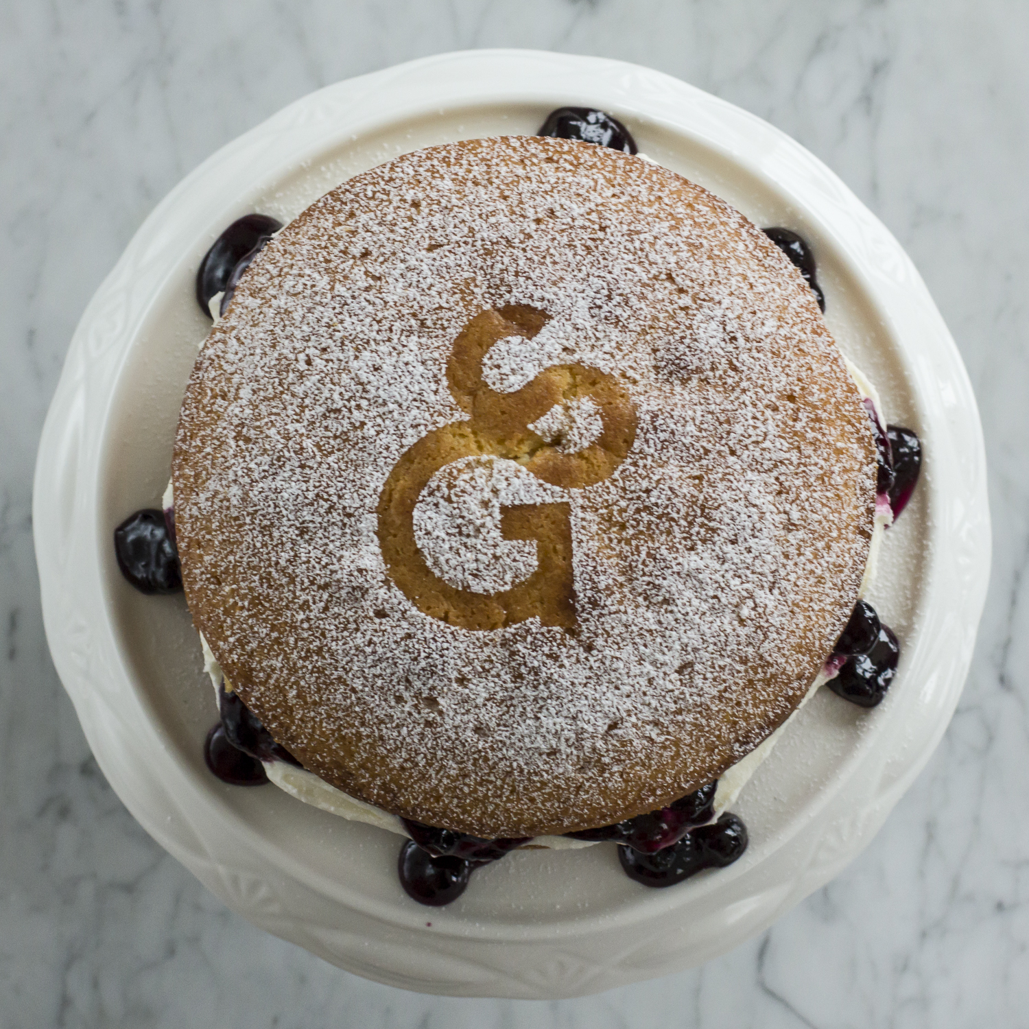 Blueberry Victoria Sponge Birthday Cake dusted with South Granville Inhabiter Logo © 2014 Helena McMurdo